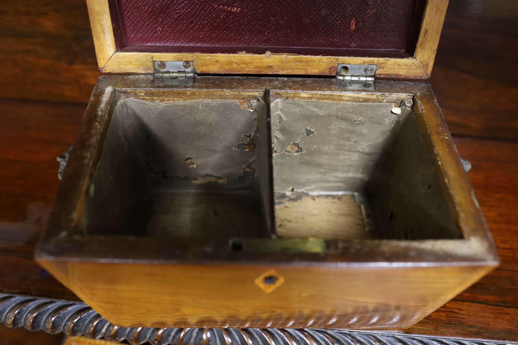 A Victorian flame-veneered tea caddy and another, smaller